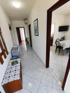 a living room with a couch and a table at Apartmani David in Pula