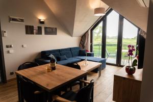 Un lugar para sentarse en Apartamenty Mazurski Rejs