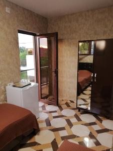 Rúm í herbergi á Hotel Kvadrati