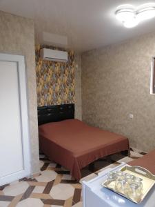 Rúm í herbergi á Hotel Kvadrati
