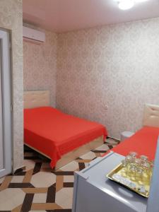 Rúm í herbergi á Hotel Kvadrati