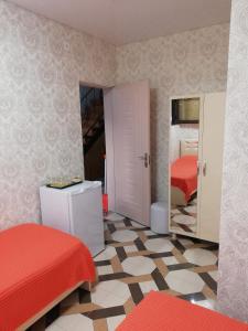 Rúm í herbergi á Hotel Kvadrati