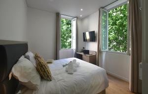 Posteľ alebo postele v izbe v ubytovaní Hôtel Continental