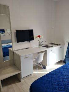 TV a/nebo společenská místnost v ubytování B&B Rayl