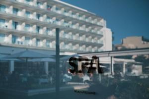 a view of a building with the word spam in the foreground at Helios Mallorca Hotel & Apartments in Can Pastilla