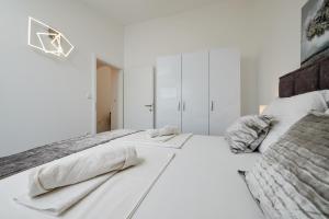 Posteľ alebo postele v izbe v ubytovaní Fratelli apartments