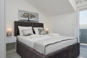 Posteľ alebo postele v izbe v ubytovaní Fratelli apartments