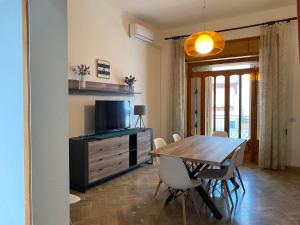 Televízia a/alebo spoločenská miestnosť v ubytovaní Casa del Faro By Cala Salento