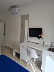 TV a/nebo společenská místnost v ubytování B&B Rayl + 10 fotografií