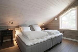 Voodi või voodid majutusasutuse Alpstigen 10A - Newly built sports lodge with amazing views toas