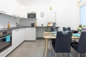 Kuchnia lub aneks kuchenny w obiekcie Yeshello Vienna Central Station Apartment
