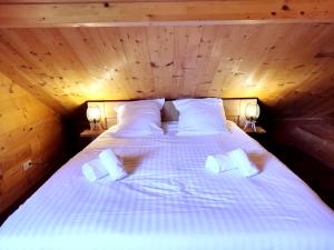 Posteľ alebo postele v izbe v ubytovaní ⁂⁂ LE NID DE PIERRE & JULIE [CLEDICIHOME] 2 pas du centre ville / SPA & TERASSE AMENAGEE ⁂⁂