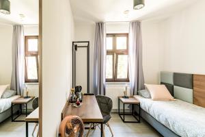 Posteľ alebo postele v izbe v ubytovaní Cooltour