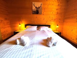 Posteľ alebo postele v izbe v ubytovaní ⁂⁂ LE NID DE PIERRE & JULIE [CLEDICIHOME] 2 pas du centre ville / SPA & TERASSE AMENAGEE ⁂⁂