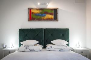 Posteľ alebo postele v izbe v ubytovaní Villa Dioniz + 37 fotografií