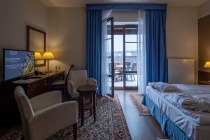 Posteľ alebo postele v izbe v ubytovaní Hotel Słoneczny Młyn