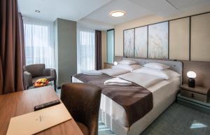 Posteľ alebo postele v izbe v ubytovaní Hunguest Hotel Bál Resort