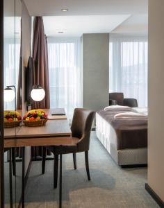Posteľ alebo postele v izbe v ubytovaní Hunguest Hotel Bál Resort