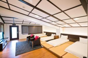 Et opholdsområde på Qing Ping Jn Humanities Hall青萍居人文會館