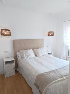 Posteľ alebo postele v izbe v ubytovaní Hotel Posada del Mar