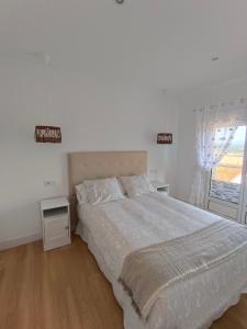 Posteľ alebo postele v izbe v ubytovaní Hotel Posada del Mar