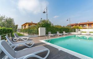 The swimming pool at or close to Amazing Home In Puegnago Sul Garda Még 24 kép