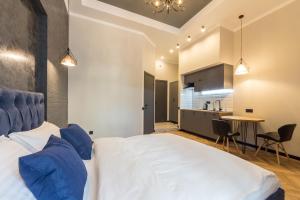 Kuchyň nebo kuchyňský kout v ubytování Secret Apartments