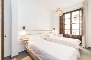 Posteľ alebo postele v izbe v ubytovaní Modern Cozy flat in Granada's city centre 1
