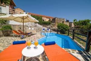 The swimming pool at or close to Villa Zoi Tzitzifes