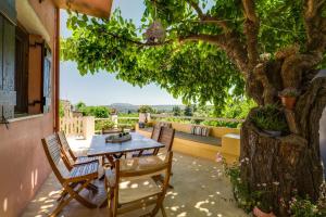 A balcony or terrace at Villa Zoi Tzitzifes