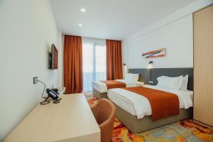 Voodi või voodid majutusasutuse Graphic Hotel Batumi toas