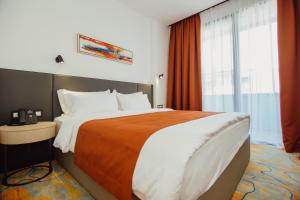 Voodi või voodid majutusasutuse Graphic Hotel Batumi toas