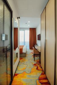 Voodi või voodid majutusasutuse Graphic Hotel Batumi toas