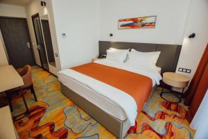 Voodi või voodid majutusasutuse Graphic Hotel Batumi toas