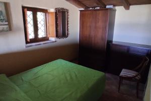 Postel nebo postele na pokoji v ubytování Suite in palmento d'epoca