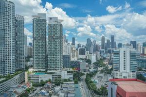 a view of a city with tall buildings at Casa Residency Apartment in Kuala Lumpur