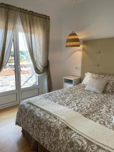 Posteľ alebo postele v izbe v ubytovaní Hotel Posada del Mar