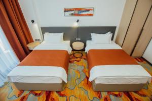 Voodi või voodid majutusasutuse Graphic Hotel Batumi toas
