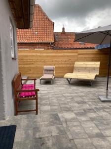 Balkón nebo terasa v ubytování Pappelhof - Doppelhaushälfte mit Garten in Grömitz