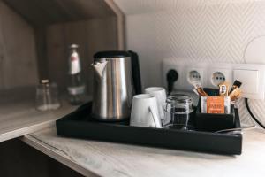 Příslušenství pro přípravu čaje a kávy v ubytování Best Western Hotel Kurfürst Wilhelm I.