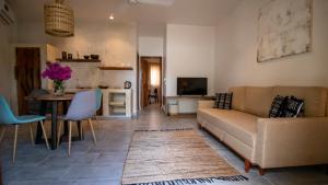 TV a/nebo společenská místnost v ubytování Tamu Tamu Boutique Hotel