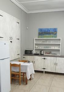 Η κουζίνα ή μικρή κουζίνα στο Stoep Cafe Guest House