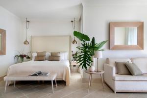 Cama ou camas em um quarto em Hotel Don Pepe Gran Meliá