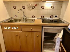 Kuchyňa alebo kuchynka v ubytovaní Apartments Fiordalisi