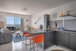 Kuchyňa alebo kuchynka v ubytovaní Vue mer - Appartement face mer pour 6