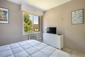 Posteľ alebo postele v izbe v ubytovaní Vue mer - Appartement face mer pour 6