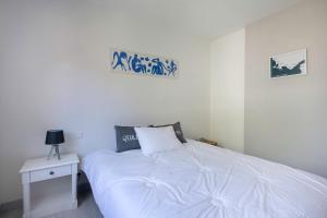Posteľ alebo postele v izbe v ubytovaní Vue mer - Appartement face mer pour 6