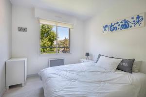 Posteľ alebo postele v izbe v ubytovaní Vue mer - Appartement face mer pour 6