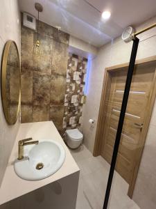 Kúpeľňa v ubytovaní Centrum Gdańska - apartament dla 2 osób