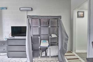 a bedroom with a bunk bed with a desk at Atlantic City Studio with Beach Access On-Site! in Atlantic City